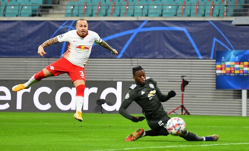 Angelino scores past Aaron Wan-Bissaka